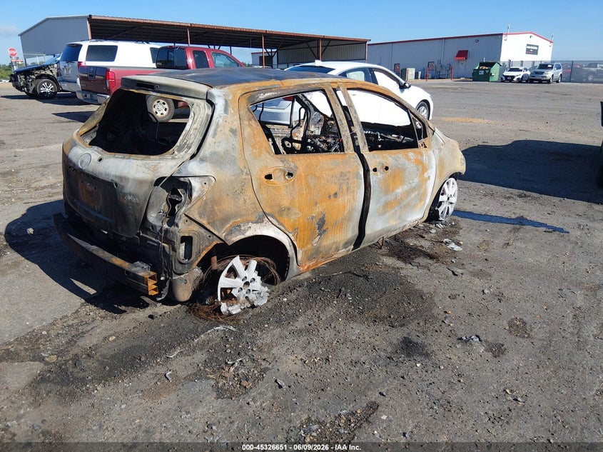 2015 Toyota Yaris VIN VNKKTUD35FA039575 IAAI salvage auction — TOTAL BURN, Salvage Title, sold $75 on 2026-07-15 (photo 4)