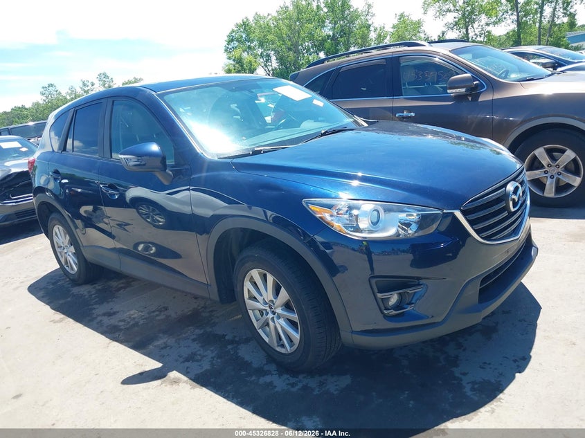 2016 Mazda Cx-5 VIN JM3KE4CYXG0908413 IAAI salvage auction — HAIL, Salvage (Ohio), sold $3,075 on 2026-07-14 (photo 1)