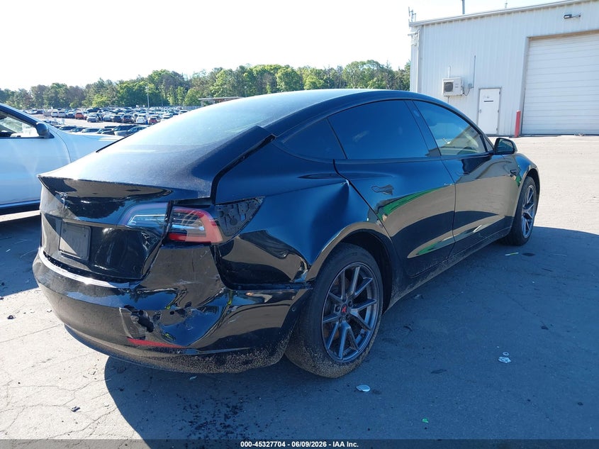 2021 Tesla Model 3 VIN 5YJ3E1EA4MF982015 IAAI salvage auction — REAR END, Salvage Title, sold $4,650 on 2026-07-21 (photo 4)