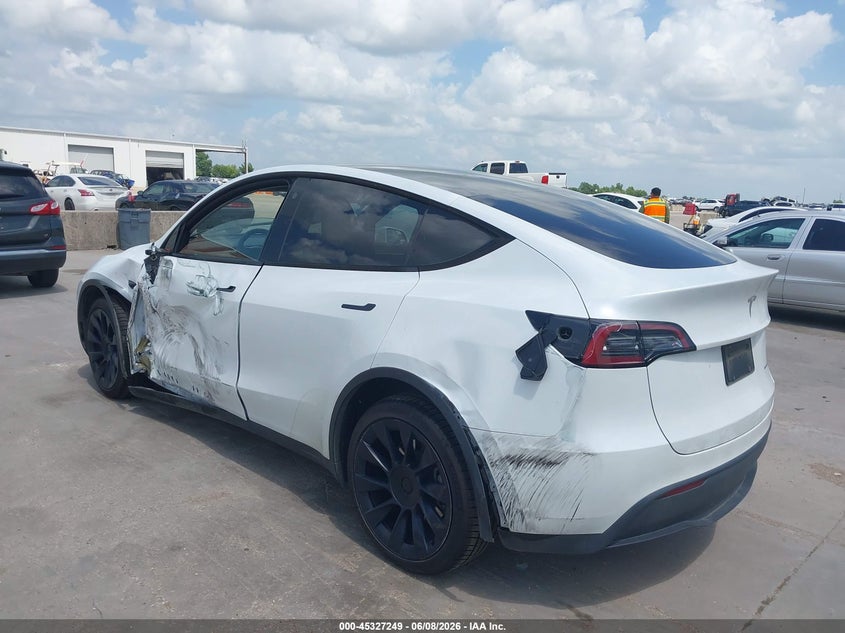 2023 Tesla Model y VIN 7SAYGDEE4PA101130 IAAI salvage auction — SIDE, Salvage Title, sold $11,100 on 2026-07-22 (photo 3)