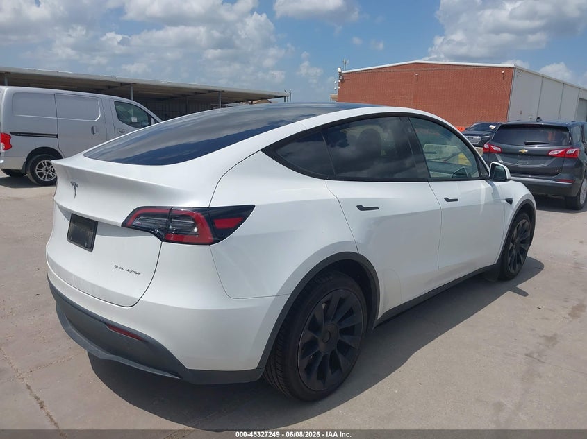2023 Tesla Model y VIN 7SAYGDEE4PA101130 IAAI salvage auction — SIDE, Salvage Title, sold $11,100 on 2026-07-22 (photo 4)
