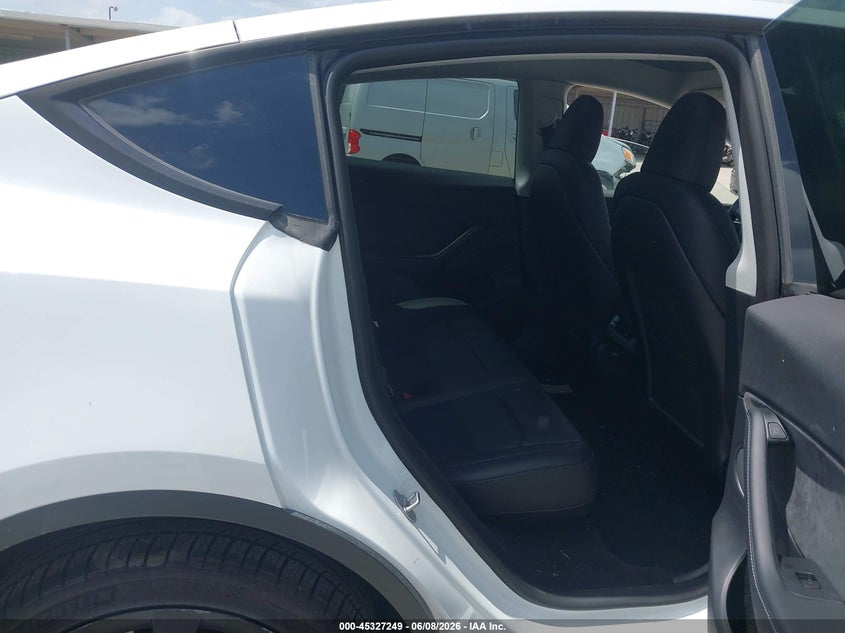 2023 Tesla Model y VIN 7SAYGDEE4PA101130 IAAI salvage auction — SIDE, Salvage Title, sold $11,100 on 2026-07-22 (photo 8)