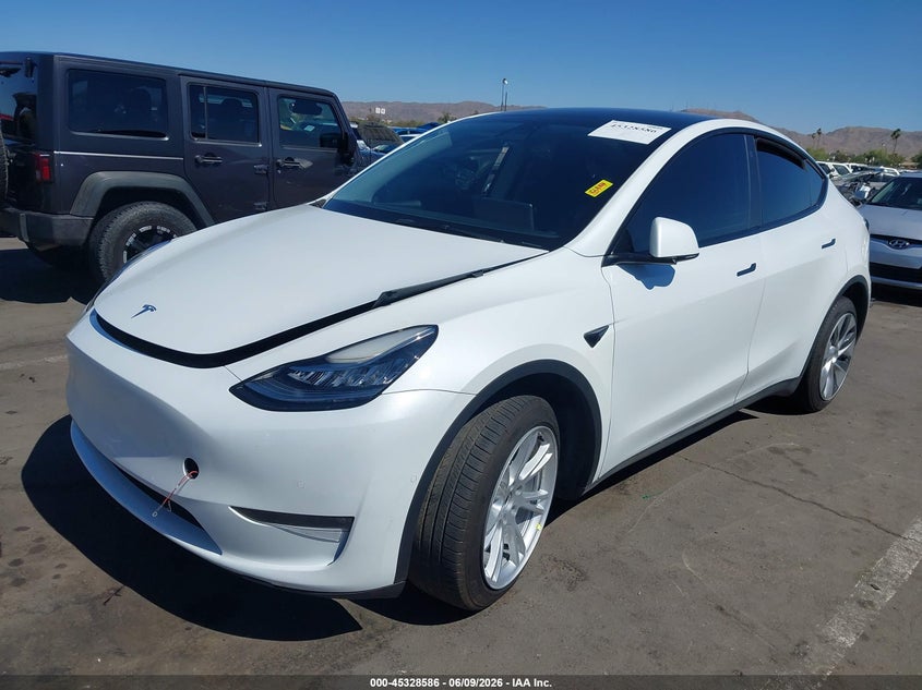 2022 Tesla Model y VIN 7SAYGDEE8NF449299 IAAI salvage auction — RIGHT SIDE, Salvage (Arizona), sold $6,100 on 2026-07-28 (photo 2)