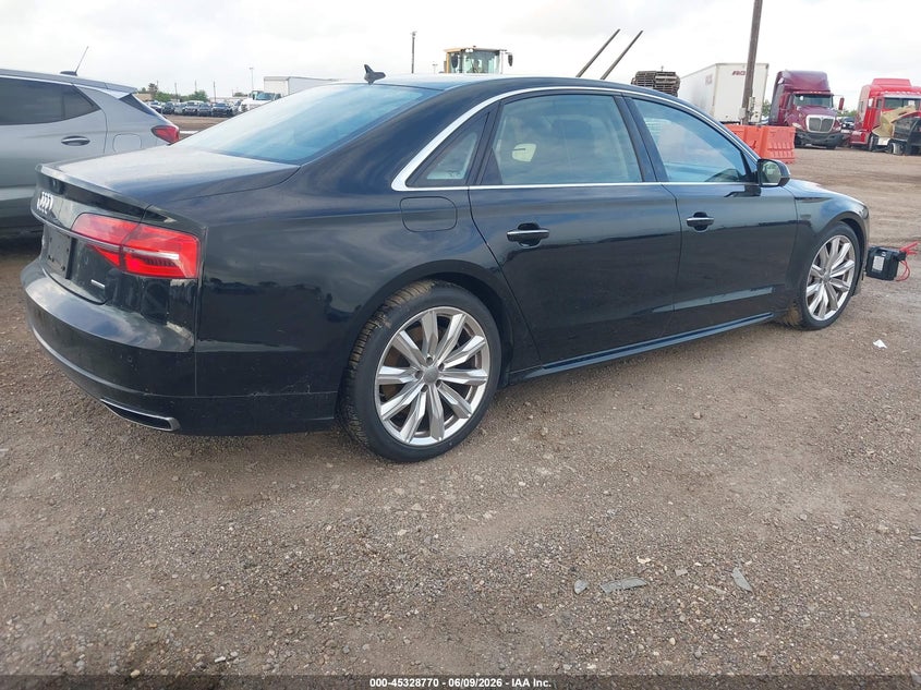 2017 Audi A8 VIN WAU44AFD2HN012457 IAAI salvage auction — WATER/FLOOD, Salvage Title, sold $2,050 on 2026-07-15 (photo 4)