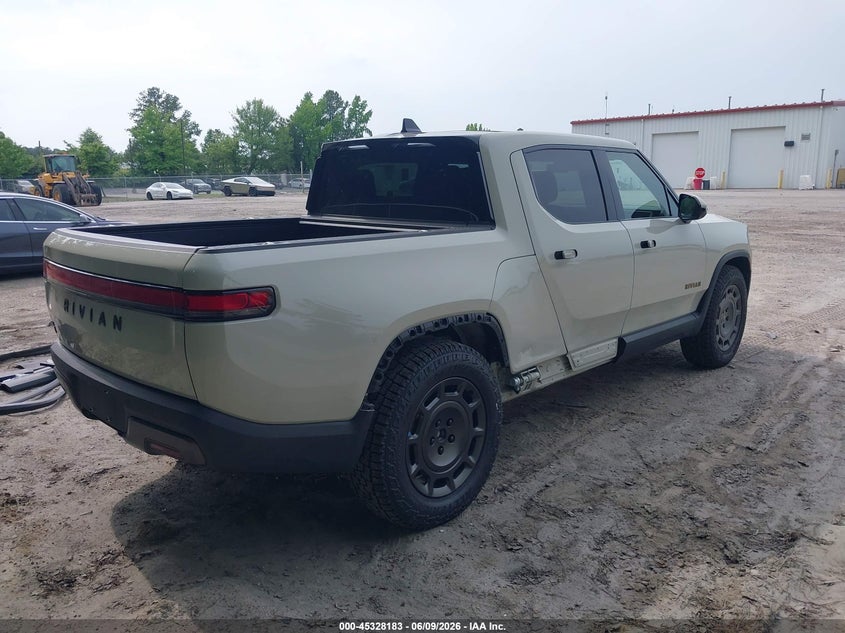 2025 Rivian R1t VIN 7FCTGCAA3SN040932 IAAI salvage auction — SIDE, Salvage Title, sold $33,750 on 2026-07-22 (photo 6)