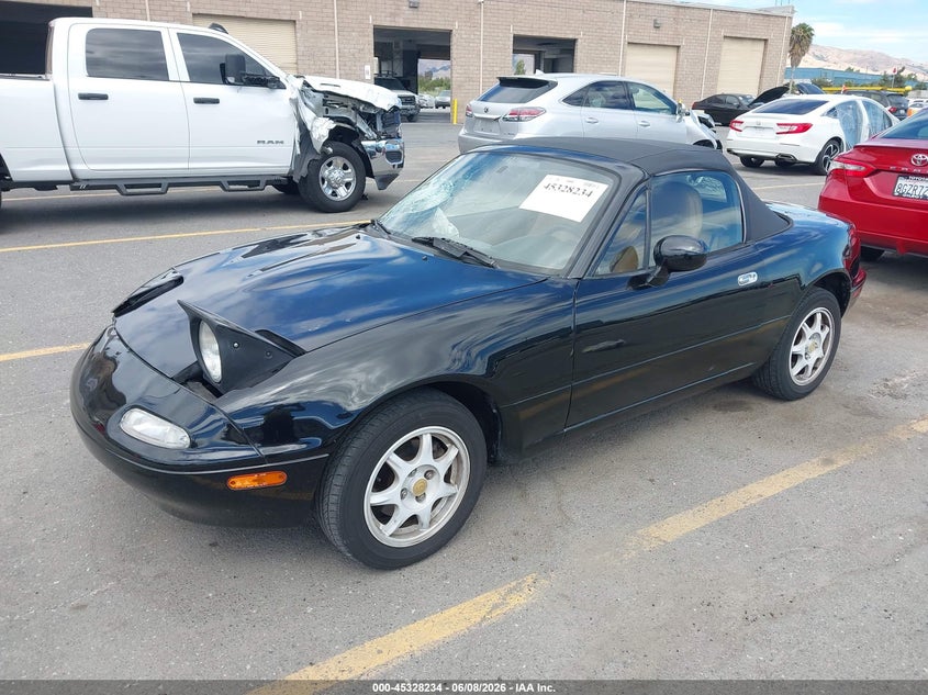 1996 Mazda Mx-5 VIN JM1NA3538T0716740 IAAI salvage auction — RIGHT FRONT, Salvage (California), sold $2,150 on 2026-07-20 (photo 2)