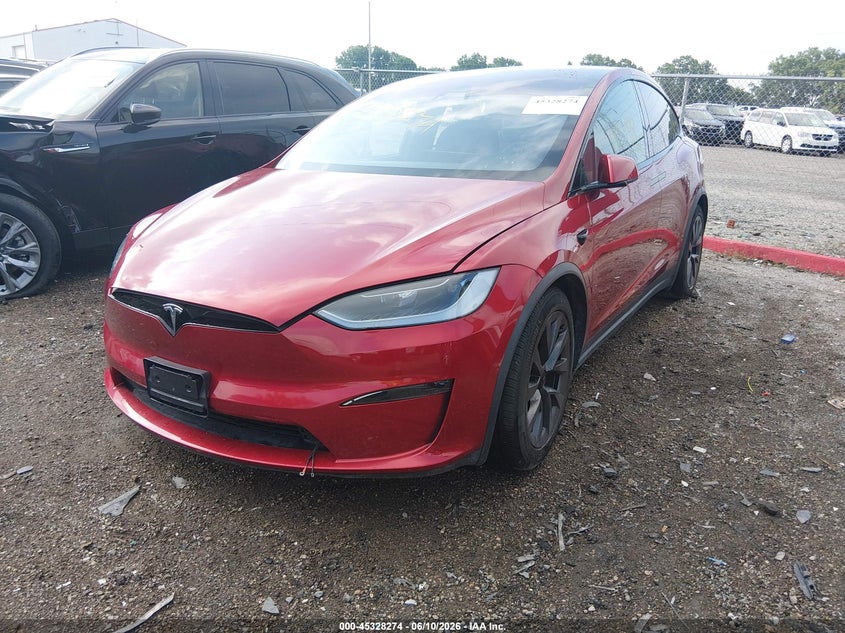2023 Tesla Model x VIN 7SAXCDE55PF427027 IAAI salvage auction — SIDE, Salvage Title, sold $22,750 on 2026-09-23 (photo 2)