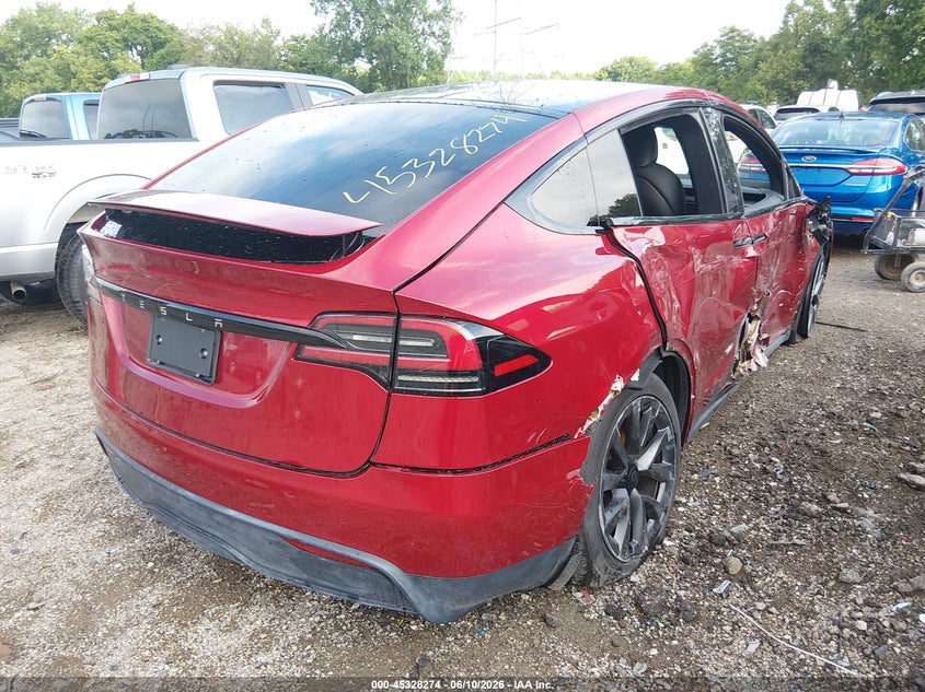 2023 Tesla Model x VIN 7SAXCDE55PF427027 IAAI salvage auction — SIDE, Salvage Title, sold $22,750 on 2026-09-23 (photo 4)
