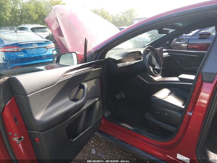 2023 Tesla Model x VIN 7SAXCDE55PF427027 IAAI salvage auction — SIDE, Salvage Title, sold $22,750 on 2026-09-23 (photo 5)