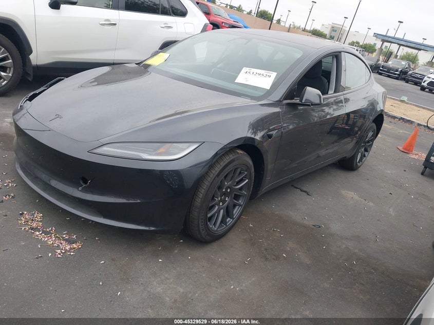 2026 Tesla Model 3 VIN 5YJ3E1EA7TF164857 IAAI salvage auction — RIGHT FRONT, Salvage Title, sold $12,250 on 2026-07-17 (photo 2)