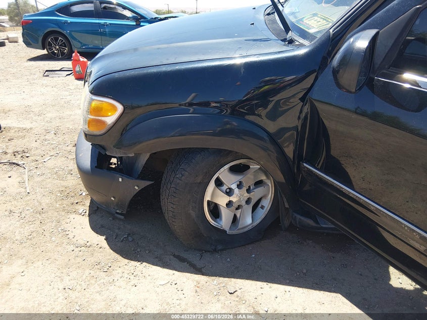 2001 Toyota Sequoia VIN 5TDBT48A51S044403 IAAI salvage auction — SIDE, Salvage (New Mexico), sold $1,000 on 2026-07-12 (photo 6)