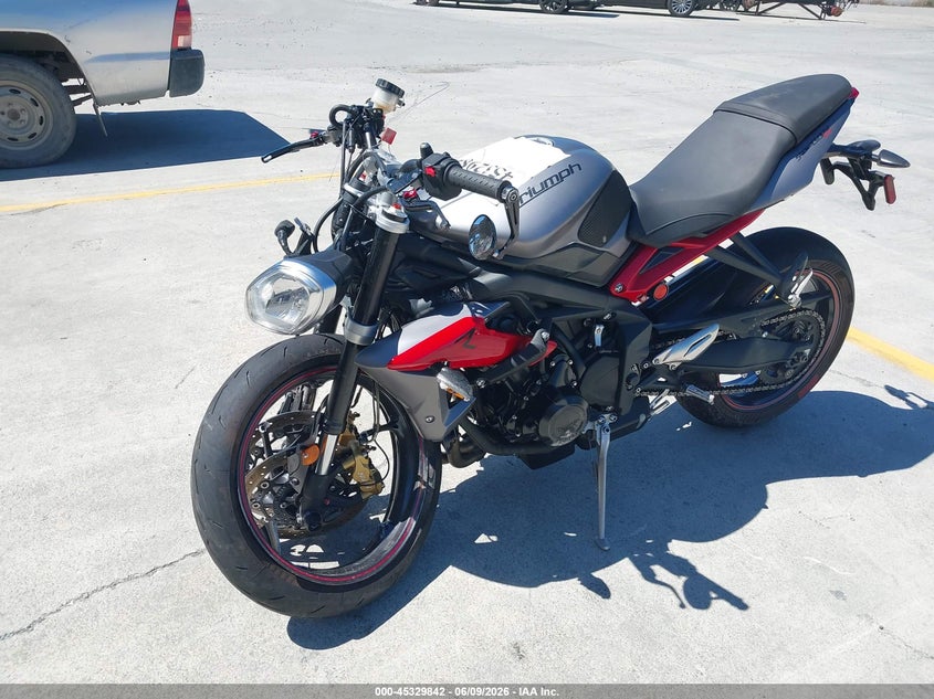 2014 Triumph motorcycle Street VIN SMTL03NE9ET622736 IAAI salvage auction — ROLLOVER, Salvage (California), sold $600 on 2026-07-13 (photo 2)