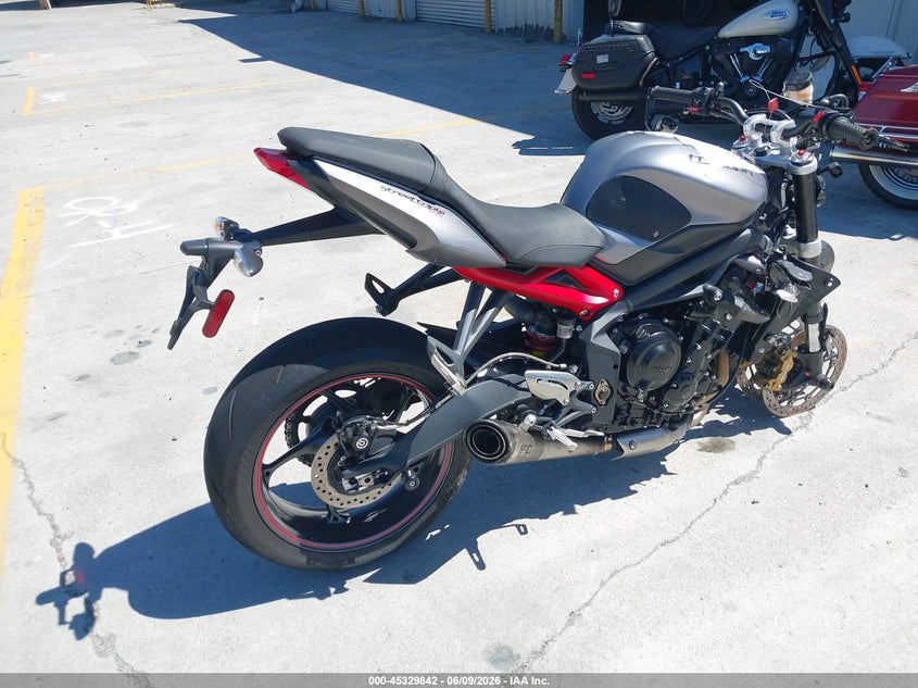 2014 Triumph motorcycle Street VIN SMTL03NE9ET622736 IAAI salvage auction — ROLLOVER, Salvage (California), sold $600 on 2026-07-13 (photo 4)