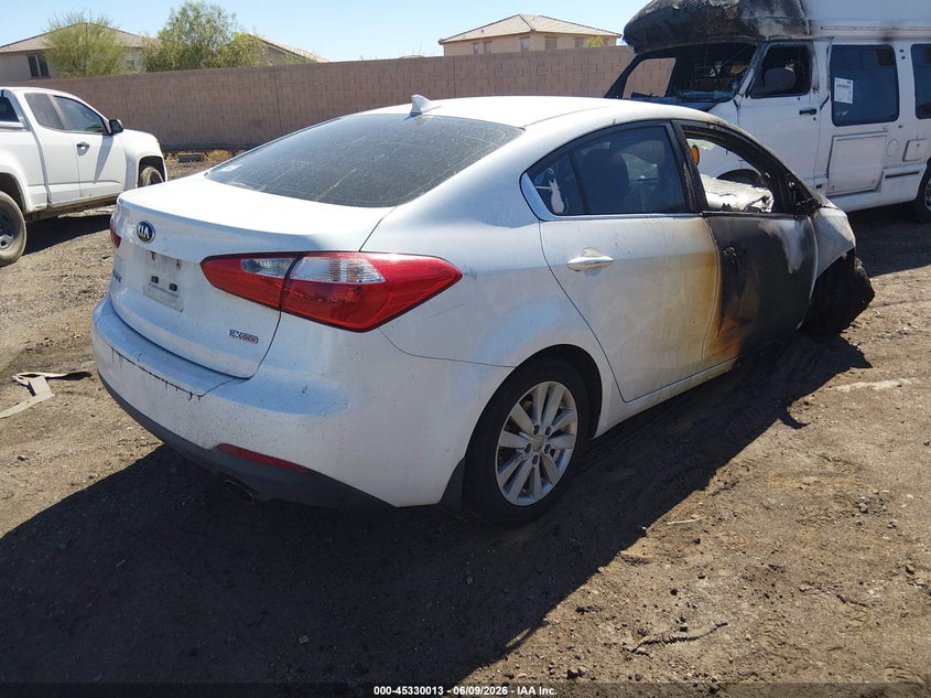 2014 Kia Forte VIN KNAFX4A89E5213022 IAAI salvage auction — EXTERIOR BURN, Salvage Title, sold $325 on 2026-07-14 (photo 4)