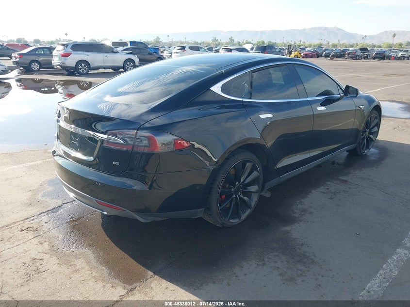 2014 Tesla Model s VIN 5YJSA1H11EFP57314 IAAI salvage auction — NORMAL WEAR, Clear (Arizona), sold $25 on 2026-07-23 (photo 4)