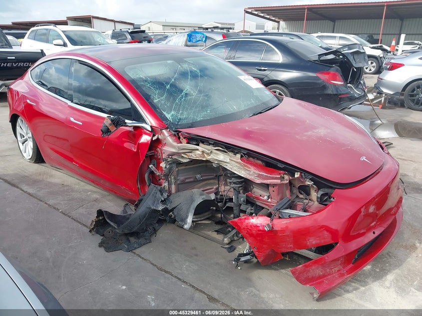 2018 Tesla Model 3 VIN 5YJ3E1EA5JF018132 IAAI salvage auction — FRONT & REAR, Salvage Title, sold $2,750 on 2026-07-09 (photo 1)