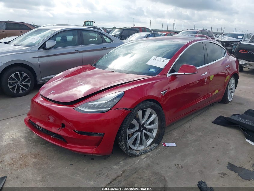2018 Tesla Model 3 VIN 5YJ3E1EA5JF018132 IAAI salvage auction — FRONT & REAR, Salvage Title, sold $2,750 on 2026-07-09 (photo 2)