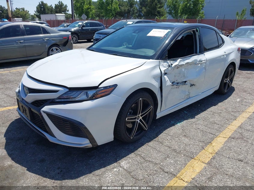 2023 Toyota Camry VIN 4T1K31AK3PU057782 IAAI salvage auction — LEFT SIDE, Salvage Title, sold $10,400 on 2026-07-28 (photo 2)