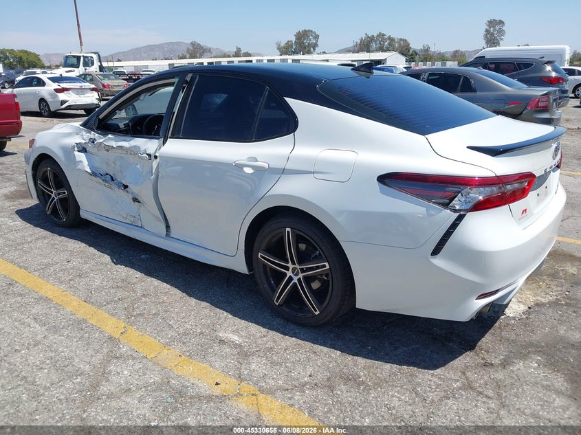 2023 Toyota Camry VIN 4T1K31AK3PU057782 IAAI salvage auction — LEFT SIDE, Salvage Title, sold $10,400 on 2026-07-28 (photo 3)