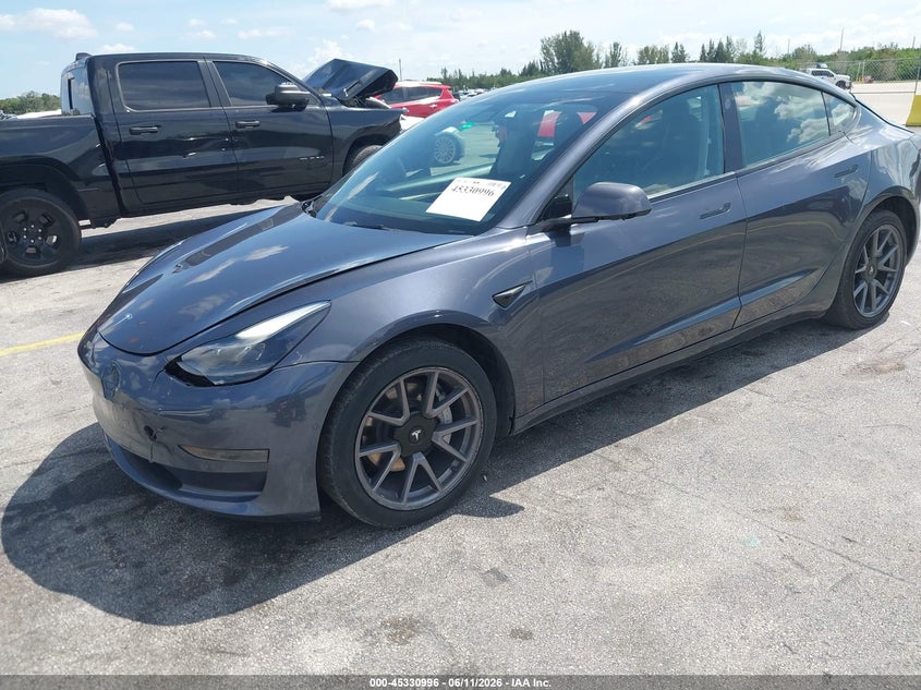 2021 Tesla Model 3 VIN 5YJ3E1EA3MF095165 IAAI salvage auction — LEFT FRONT, Salvage (Arizona), sold $5,000 on 2026-07-30 (photo 2)