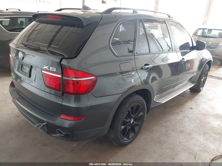 2013 BMW X5 VIN 5UXZV4C50D0B15096 IAAI salvage auction — NORMAL WEAR, Clear (Minnesota), sold $575 on 2026-07-22 (photo 4)
