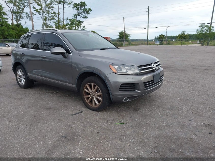 2013 Volkswagen Touareg VIN WVGEF9BP0DD008886 IAAI salvage auction — NORMAL WEAR, Salvage Title, sold $425 on 2026-07-19 (photo 1)