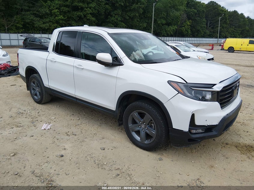 2021 Honda Ridgeline VIN 5FPYK3F51MB011377 — IAAI salvage auction photo