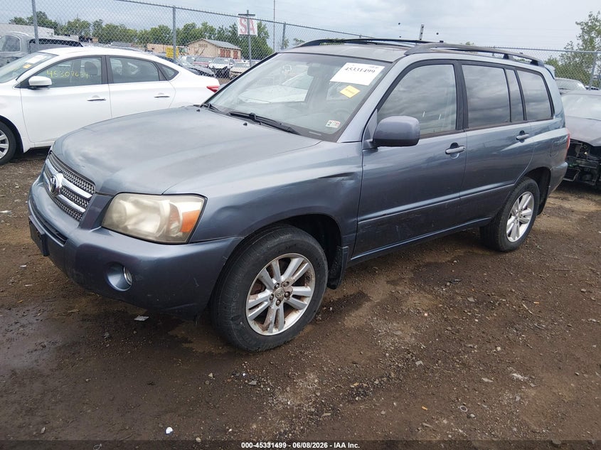 2006 Toyota Highlander hybrid VIN JTEEW21A860011615 IAAI salvage auction — NORMAL WEAR, Clear (Montana), sold $375 on 2026-07-30 (photo 2)