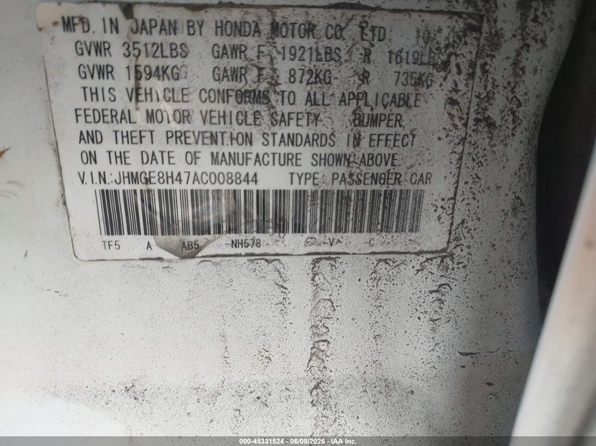 2010 Honda Fit VIN JHMGE8H47AC008844 IAAI salvage auction — NORMAL WEAR, Prior Salvage (Minnesota), sold $625 on 2026-07-15 (photo 9)