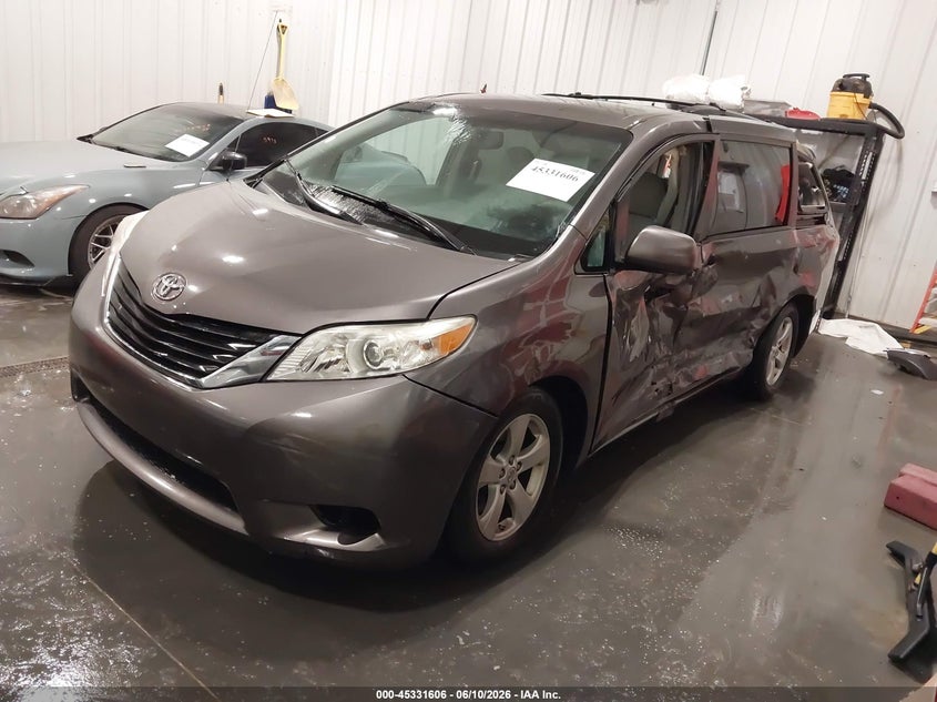 2013 Toyota Sienna VIN 5TDKK3DC1DS300240 IAAI salvage auction — LEFT & RIGHT, Certificate Of Title (Nebraska), sold $25 on 2026-07-23 (photo 2)