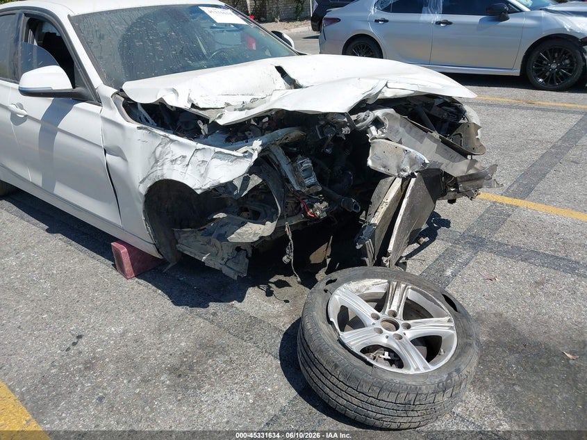 2014 BMW 3er VIN WBA3B1C54EP679402 IAAI salvage auction — FRONT & REAR, Salvage (California), sold $350 on 2026-07-14 (photo 6)