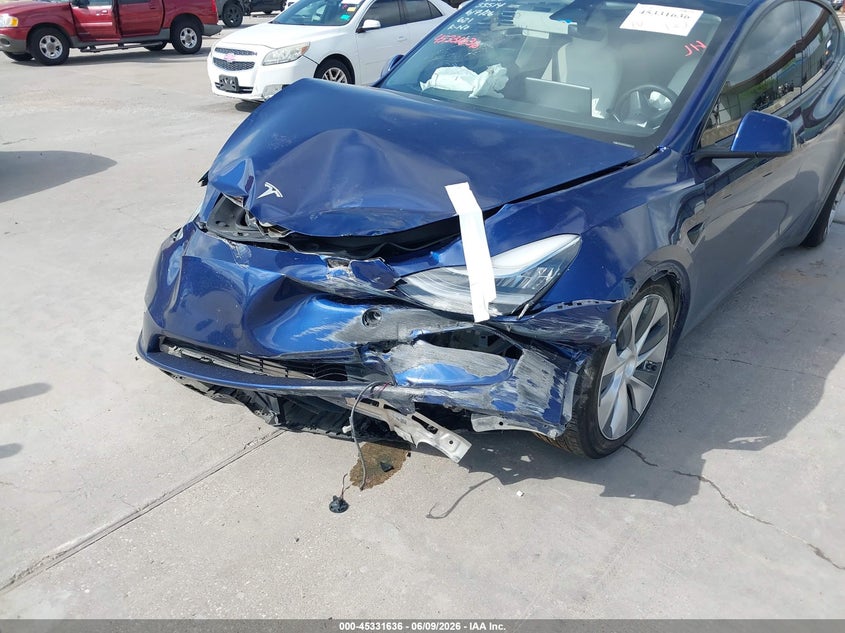 2023 Tesla Model y VIN 7SAYGDEE1PF616184 IAAI salvage auction — FRONT END, Original (Texas), sold $8,100 on 2026-07-29 (photo 6)