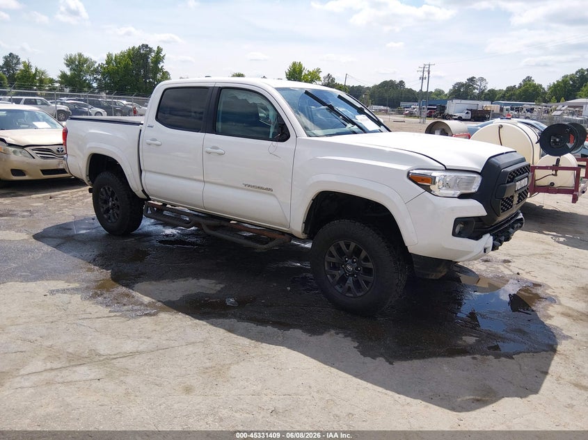 2021 Toyota Tacoma VIN 3TMCZ5AN5MM418261 IAAI salvage auction — FRONT END, Salvage Title, sold $9,850 on 2026-07-20 (photo 1)