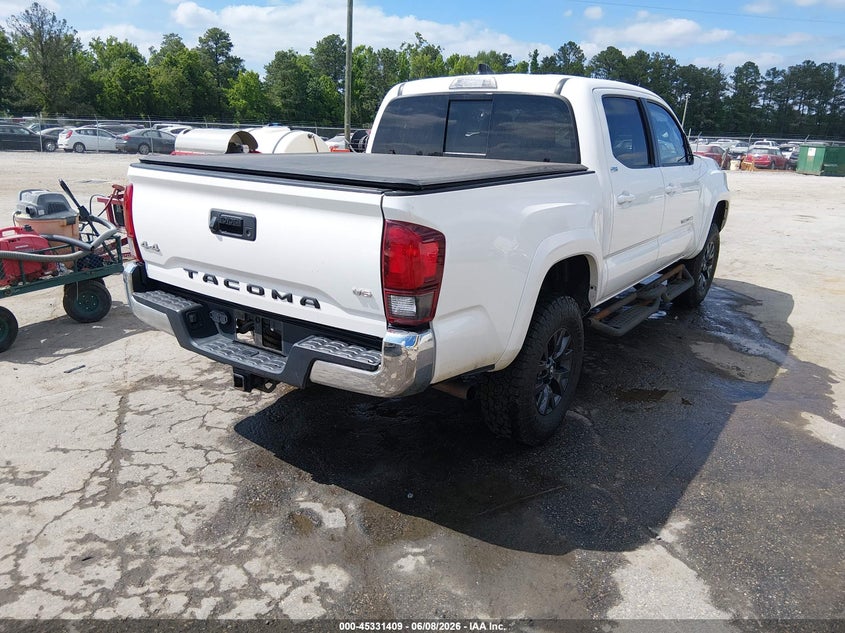 2021 Toyota Tacoma VIN 3TMCZ5AN5MM418261 IAAI salvage auction — FRONT END, Salvage Title, sold $9,850 on 2026-07-20 (photo 4)