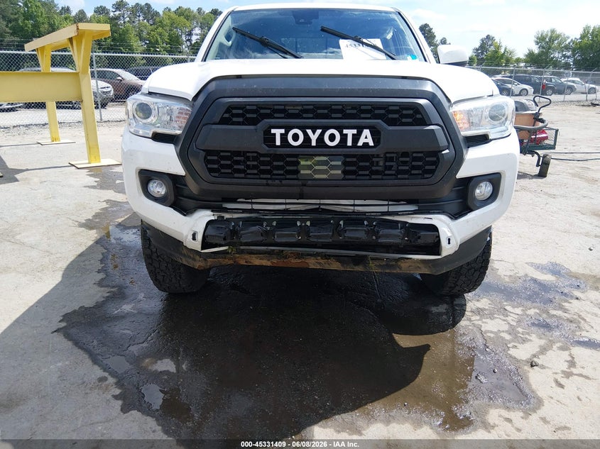 2021 Toyota Tacoma VIN 3TMCZ5AN5MM418261 IAAI salvage auction — FRONT END, Salvage Title, sold $9,850 on 2026-07-20 (photo 6)