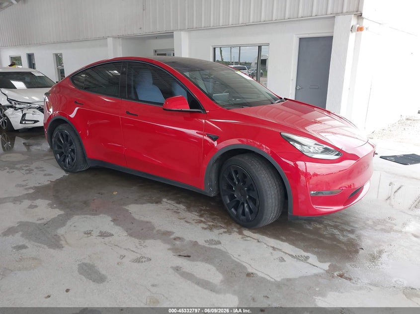 2023 Tesla Model y VIN 7SAYGAEE5PF586685 IAAI salvage auction — LEFT SIDE, Salvage Title, sold $8,900 on 2026-08-02 (photo 1)