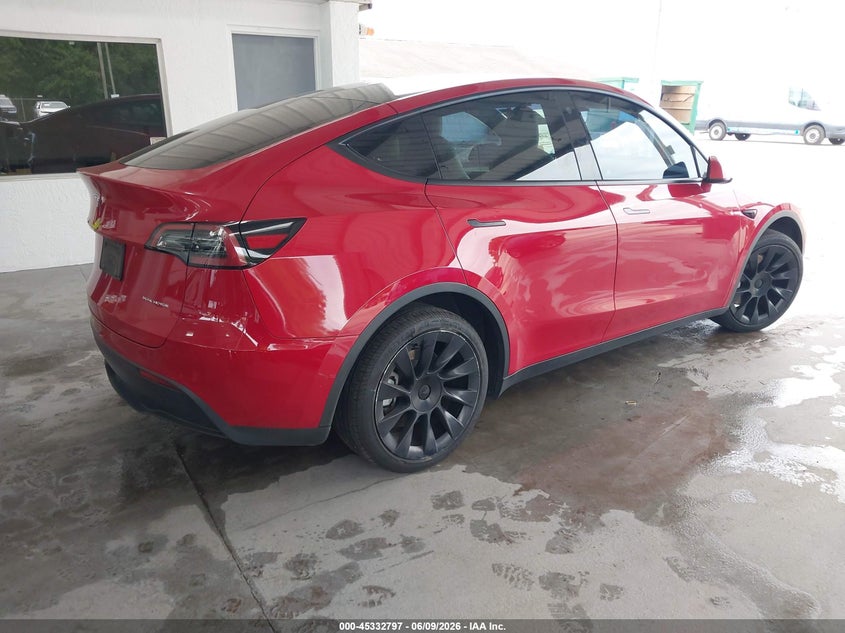 2023 Tesla Model y VIN 7SAYGAEE5PF586685 IAAI salvage auction — LEFT SIDE, Salvage Title, sold $8,900 on 2026-08-02 (photo 4)