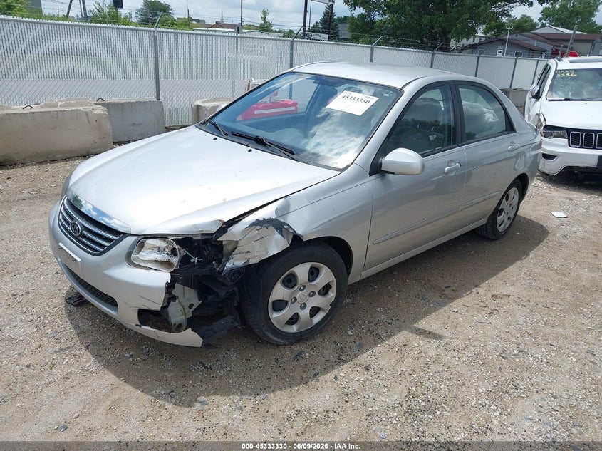 2009 Kia Spectra VIN KNAFE221795590966 IAAI salvage auction — LEFT FRONT, Salvage (Illinois), sold $675 on 2026-07-09 (photo 2)