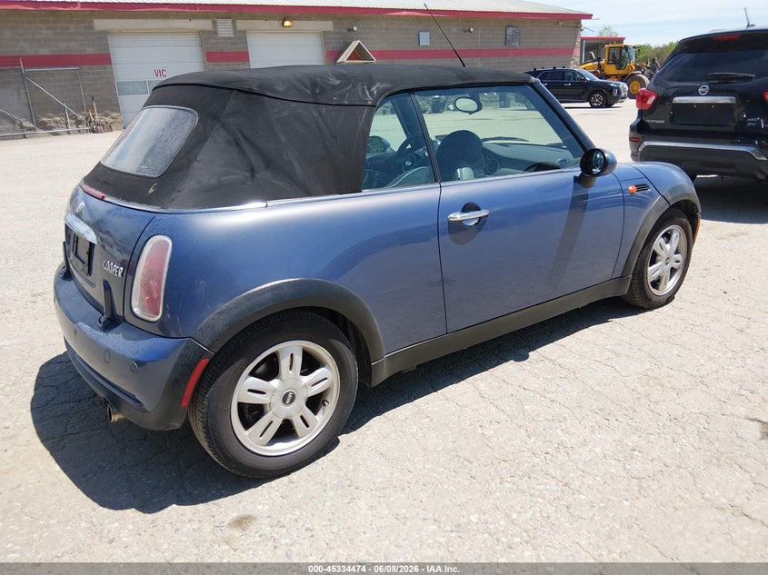 2005 Mini Cooper VIN WMWRF33575TF63633 IAAI salvage auction — NORMAL WEAR, Original (Maine), sold $300 on 2026-07-13 (photo 4)