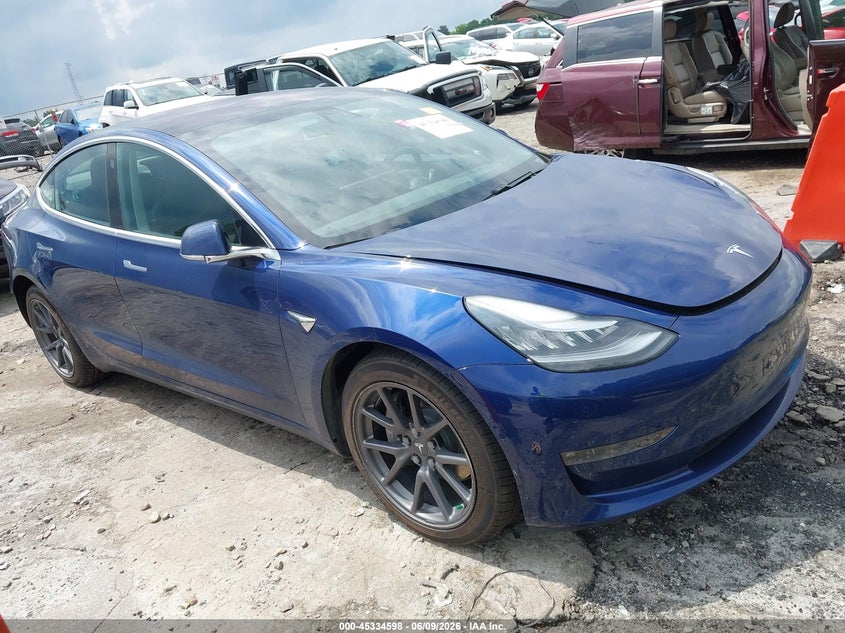 2018 Tesla Model 3 VIN 5YJ3E1EA5JF124810 IAAI salvage auction — REAR END, Salvage Title, sold $7,100 on 2026-07-15 (photo 1)