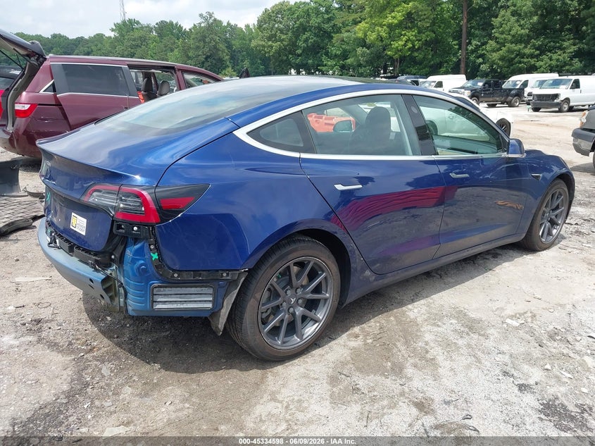 2018 Tesla Model 3 VIN 5YJ3E1EA5JF124810 IAAI salvage auction — REAR END, Salvage Title, sold $7,100 on 2026-07-15 (photo 4)
