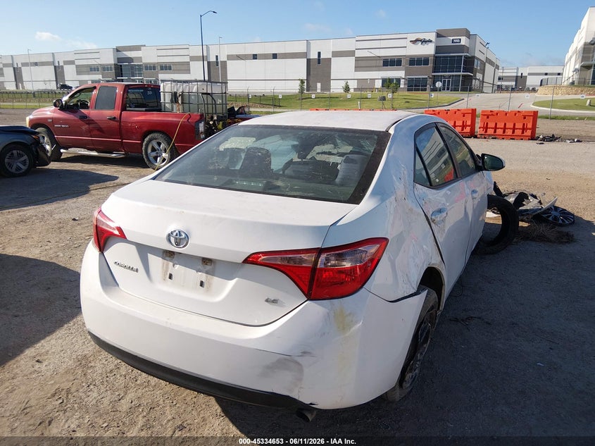 2019 Toyota Corolla VIN 5YFBURHE4KP885247 IAAI salvage auction — ROLLOVER, Salvage (Texas), sold $25 on 2026-07-28 (photo 4)