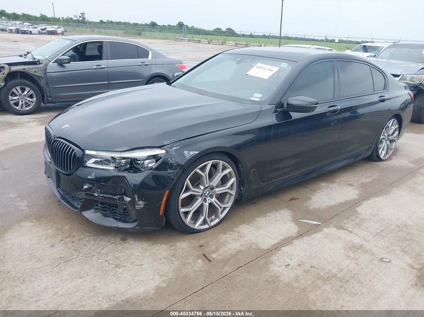 2019 BMW 7er VIN WBA7F0C56KGM24861 IAAI salvage auction — LEFT FRONT, Salvage Title, sold $11,850 on 2026-08-21 (photo 2)