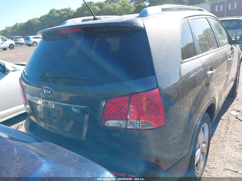 2012 Kia Sorento VIN 5XYKU3A64CG305923 IAAI salvage auction — NORMAL WEAR, Salvage Title, sold $450 on 2026-07-21 (photo 4)