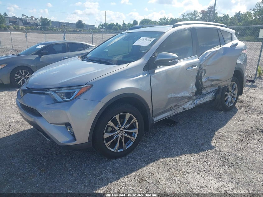 2018 Toyota Rav 4 VIN JTMYFREV8JJ211727 IAAI salvage auction — SIDE, Salvage Title, sold $5,400 on 2026-07-30 (photo 2)