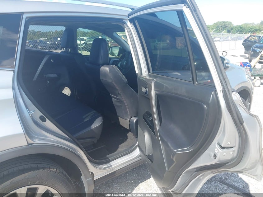 2018 Toyota Rav 4 VIN JTMYFREV8JJ211727 IAAI salvage auction — SIDE, Salvage Title, sold $5,400 on 2026-07-30 (photo 8)