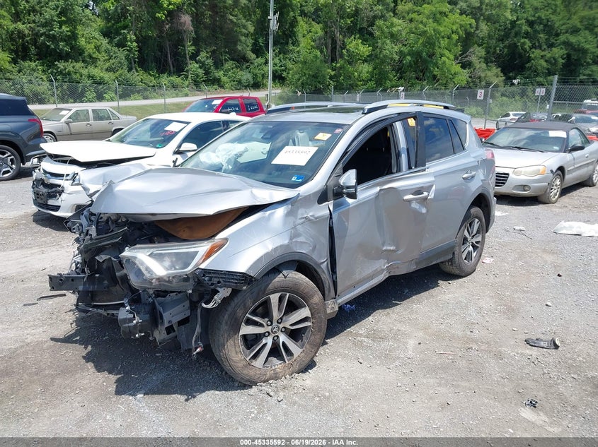 2018 Toyota Rav 4 VIN JTMRFREVXJD228077 IAAI salvage auction — ALL OVER, Salvage (Virginia), sold $3,000 on 2026-07-07 (photo 2)