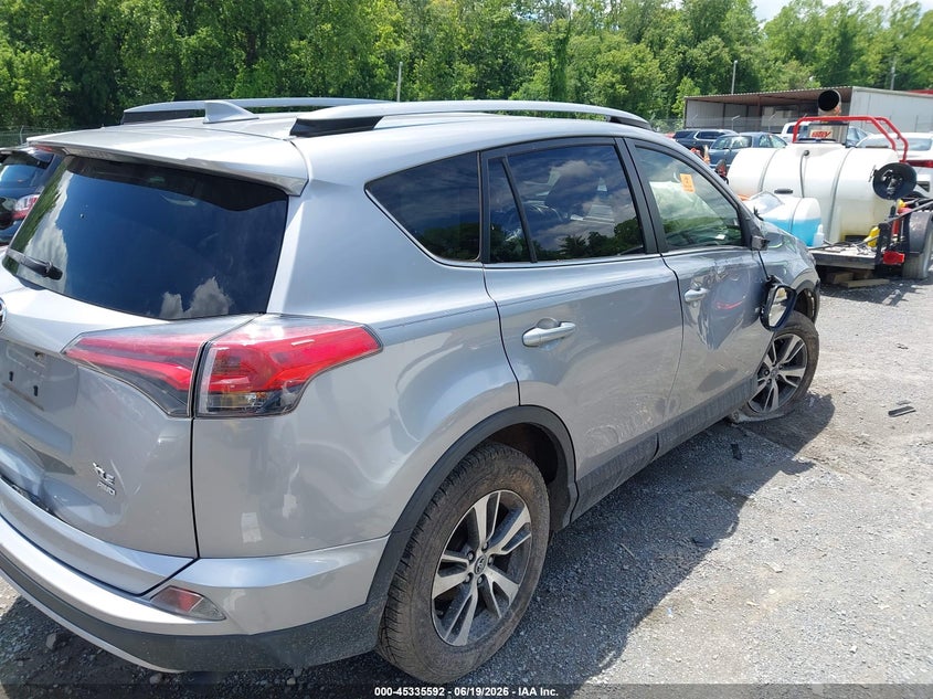 2018 Toyota Rav 4 VIN JTMRFREVXJD228077 IAAI salvage auction — ALL OVER, Salvage (Virginia), sold $3,000 on 2026-07-07 (photo 4)