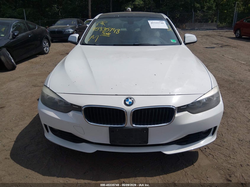 2012 BMW 3er VIN WBA3A5G50CNN65412 IAAI salvage auction — NORMAL WEAR, Salvage Title, sold $550 on 2026-07-15 (photo 6)