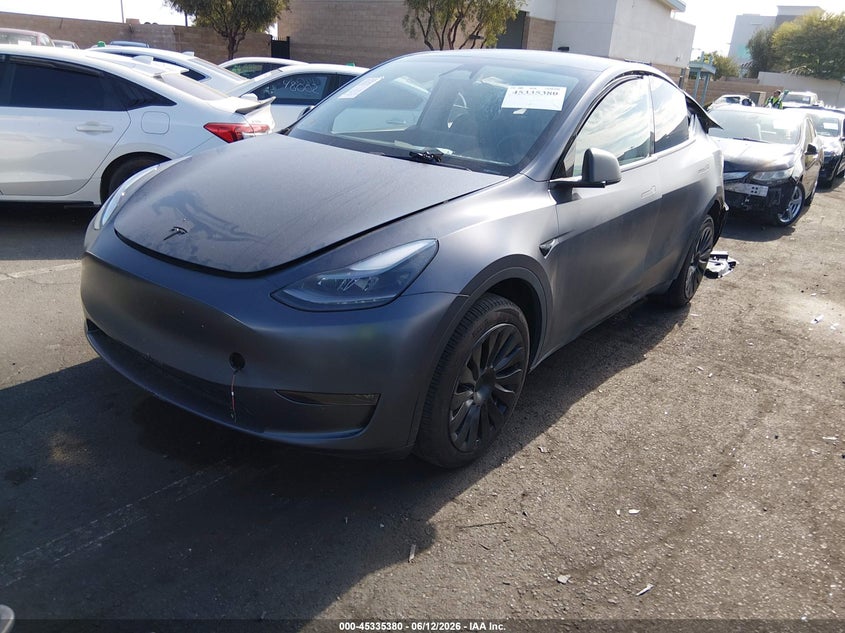 2023 Tesla Model y VIN 7SAYGDEE1PA166677 IAAI salvage auction — REAR END, Salvage Title, sold $10,300 on 2026-07-24 (photo 2)